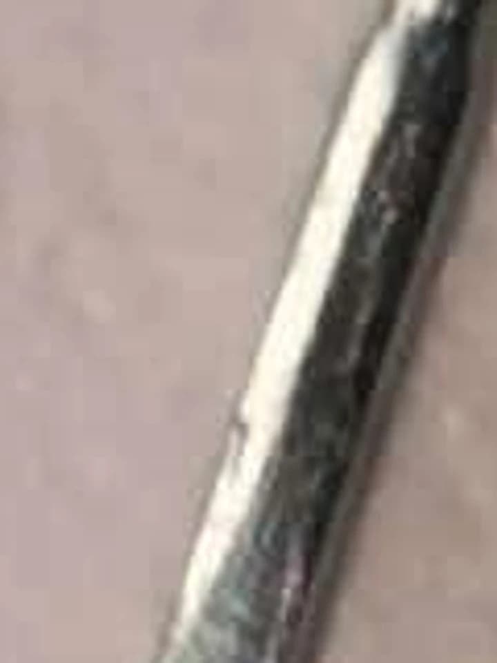 A cropped central surface of the miniature component, excluding its tip, base and complete profile